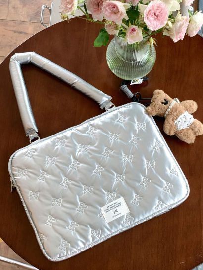 Bow‑Quilted Metallic Laptop Sleeve with Detachable Padded Handle