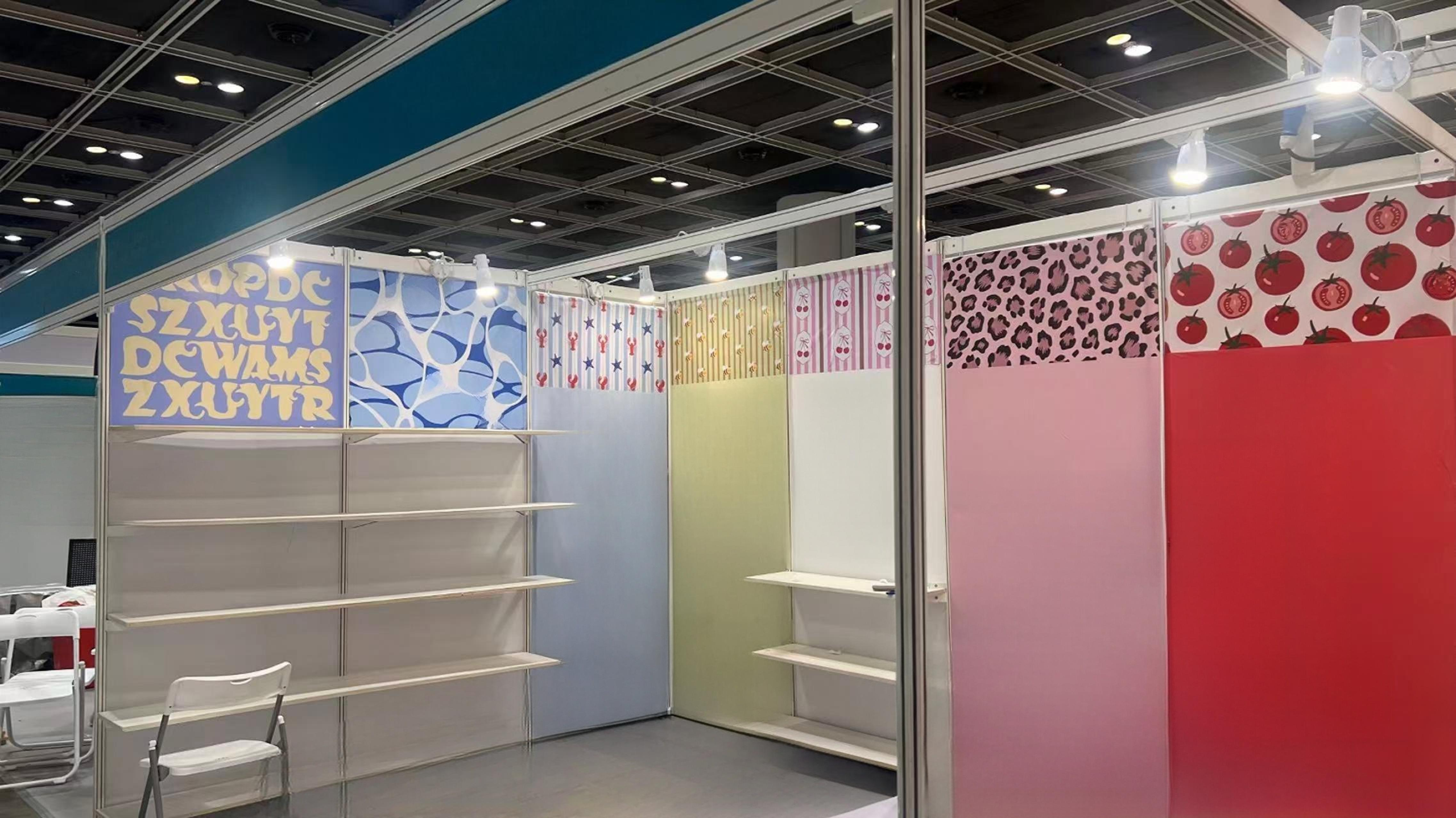 LINZHEN booth under construction with wall panels being installed